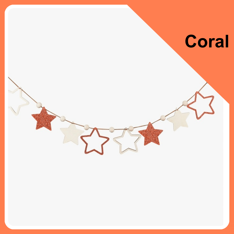 Coral glittery wood stars and beads for decoration.