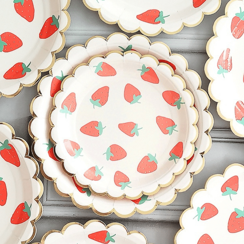 Disposable festive plates with strawberry print.