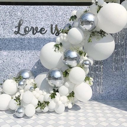 Sophisticated white and silver balloon decorations for celebrations